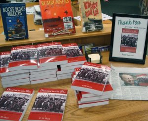 Piles of books before they were all sold